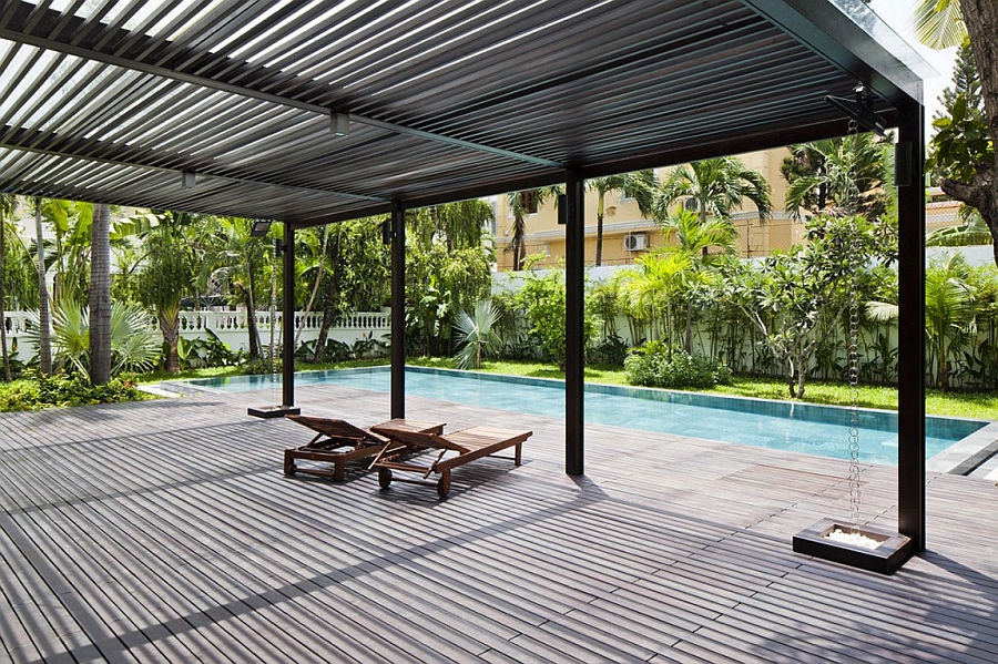 Relax under the shade on the expansive pool deck