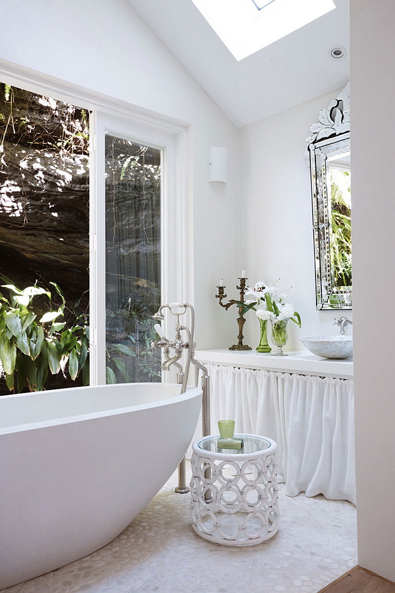 Skylight in the bathroom that is connected with the landscape outside