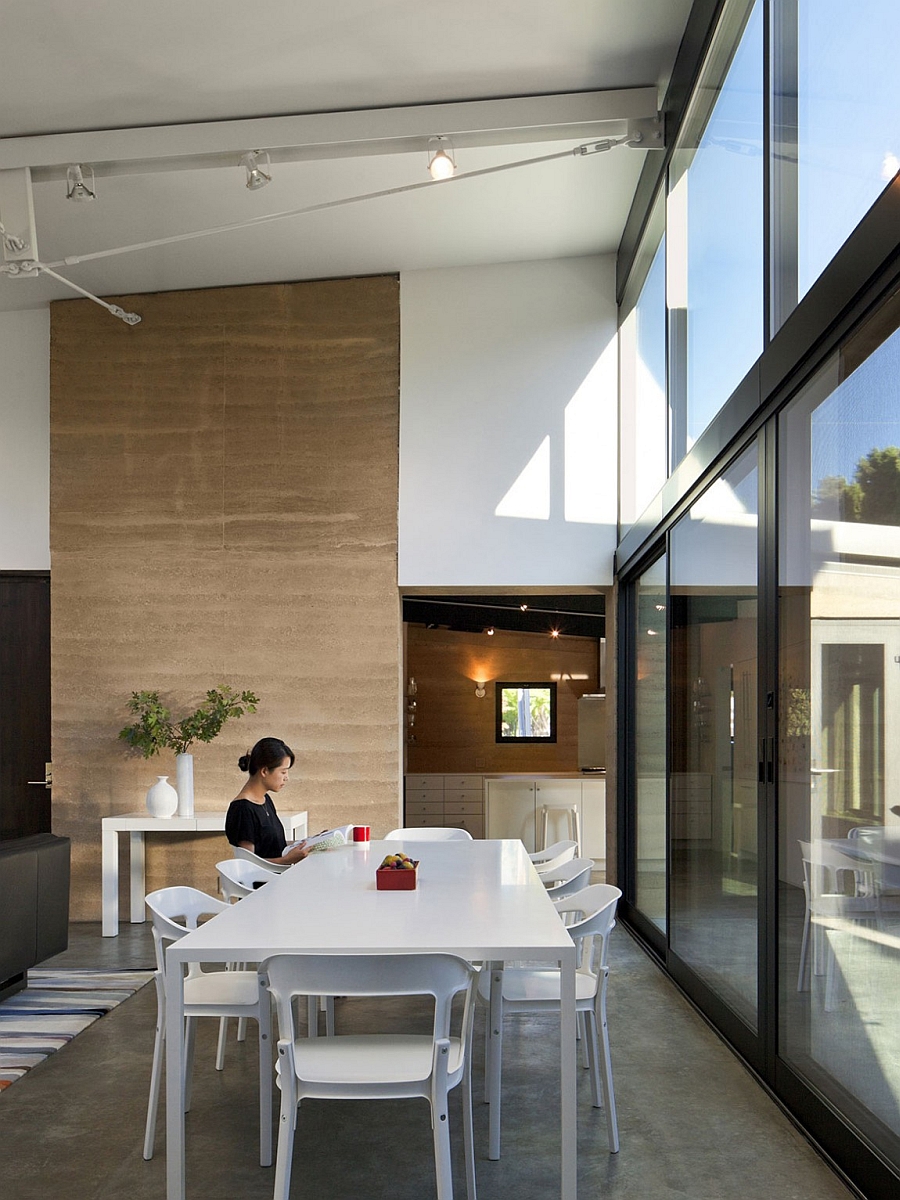 Sliding glass doors bring in ample natural ventilation