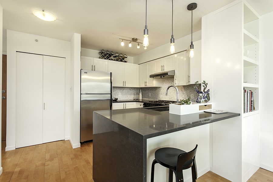 Small kitchen area with smart shelves