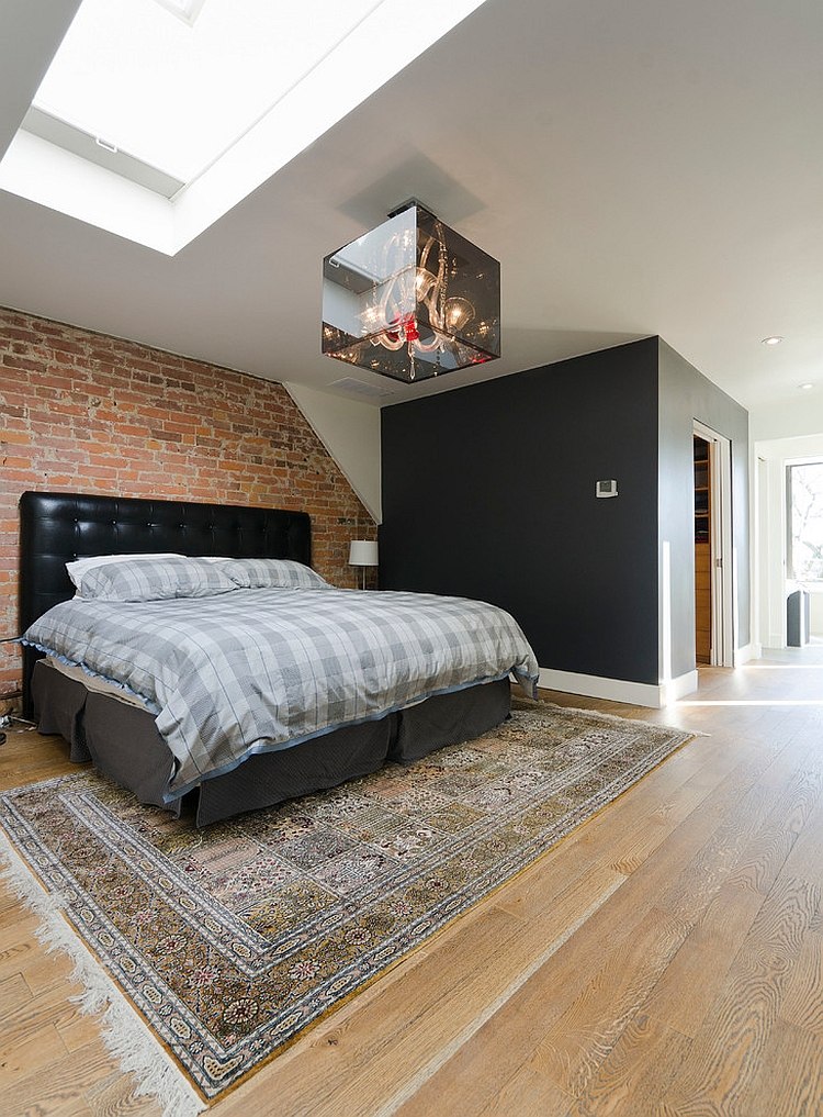 Smart chandelier and skylight illuminate the bedroom beautifully