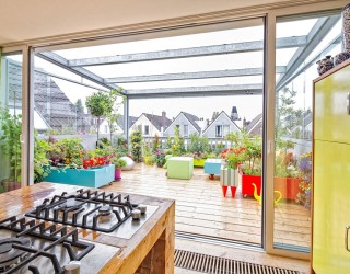 Dynamic Dutch Apartment Wows with Adaptable Roof Terrace!