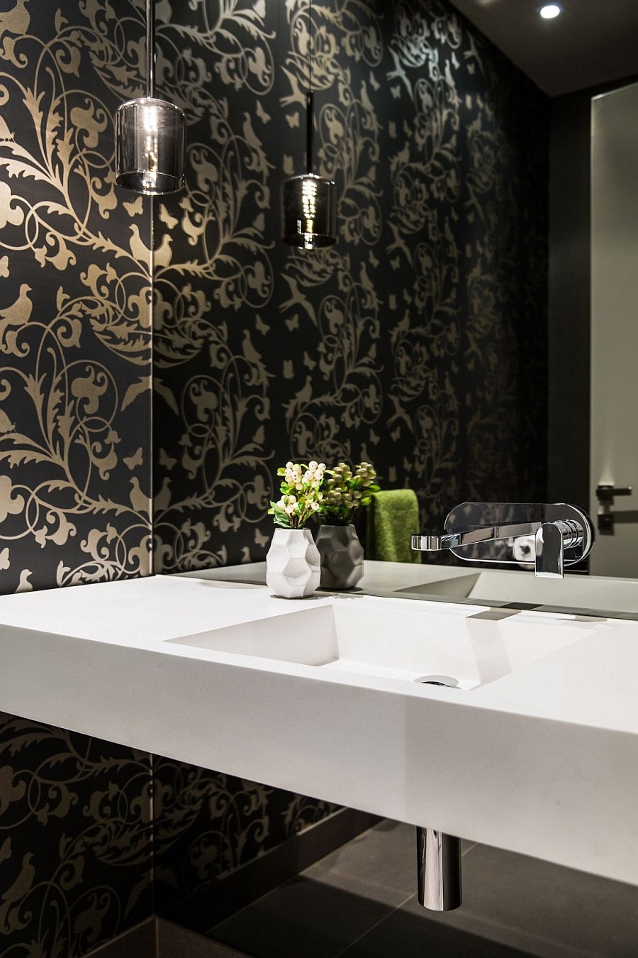 Wallpaper brings an air of luxury to the powder room