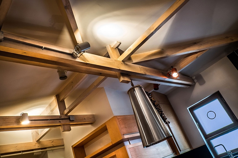 Wooden ceiling beams with cool lighting