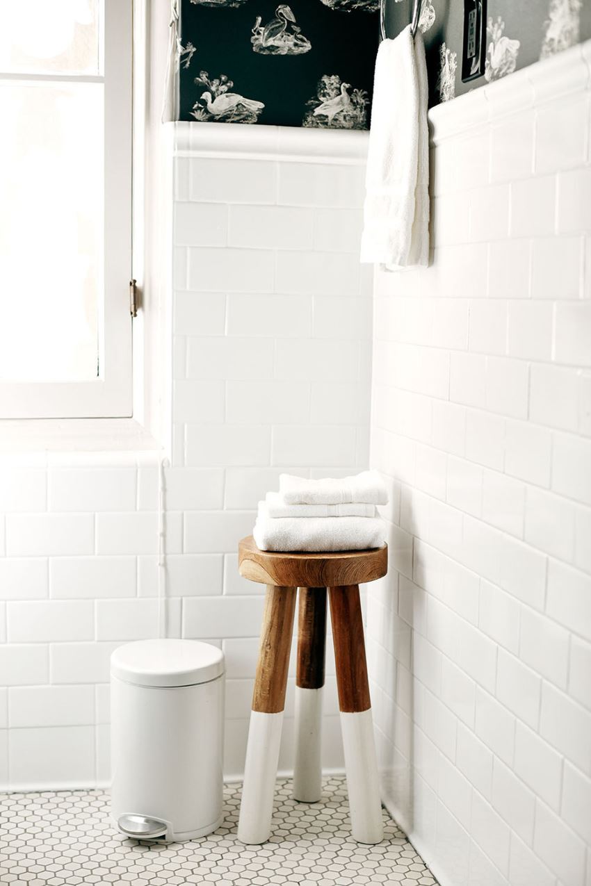 Wooden stool filled with towels