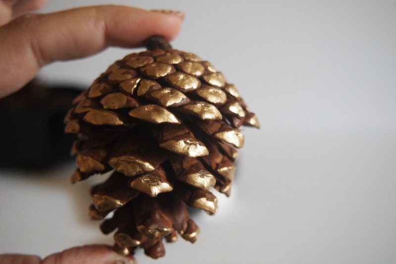 painted pine cone - gold