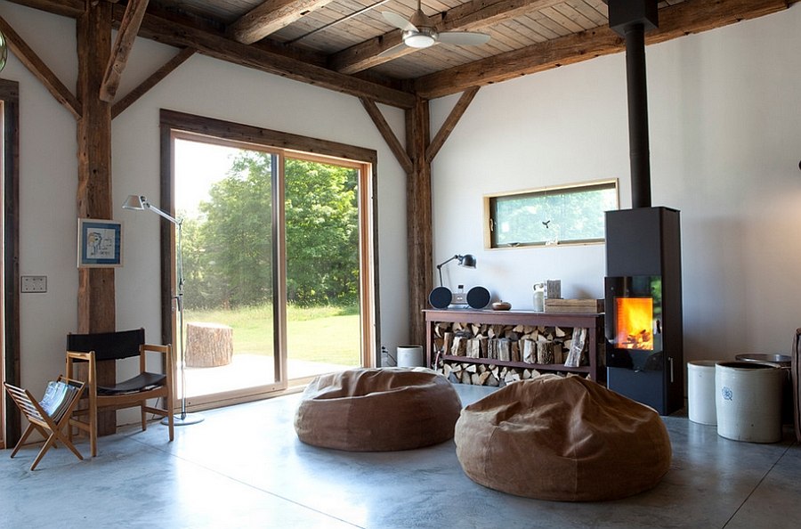 Airy rustic living room with a Danish woodstove [Design: Kimberly Peck Architect]