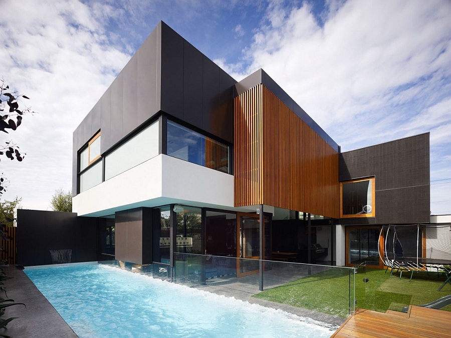 Backyard of the contemporary Geelong home with a refreshing pool and lovely garden