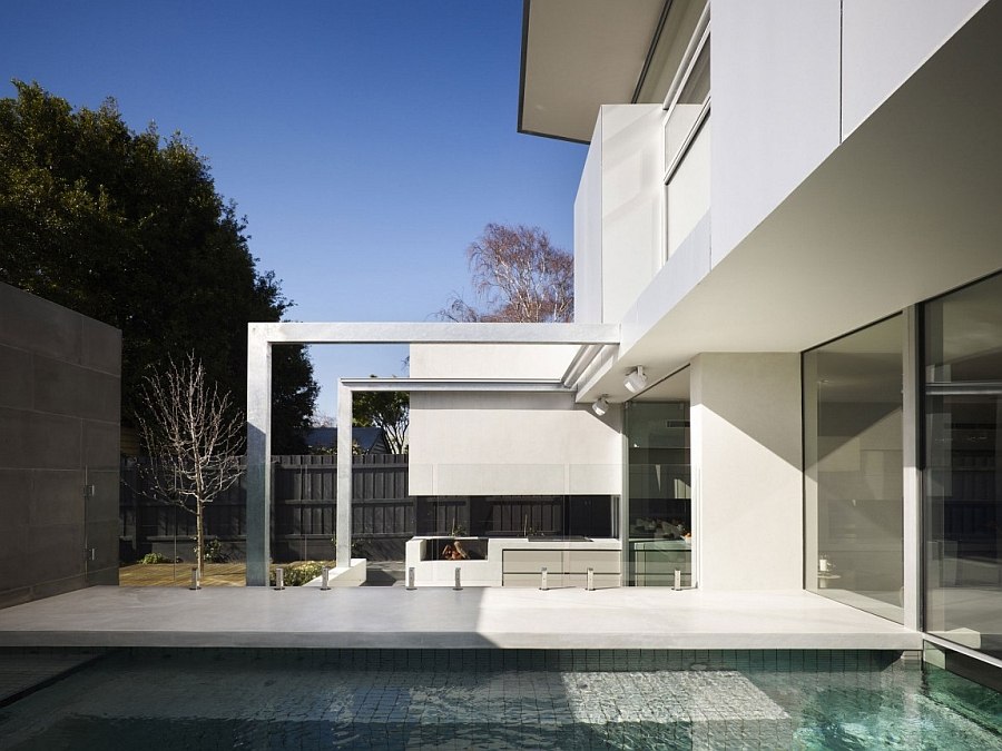 Backyard pool and barbecue area of the gorgeous Mebourne house