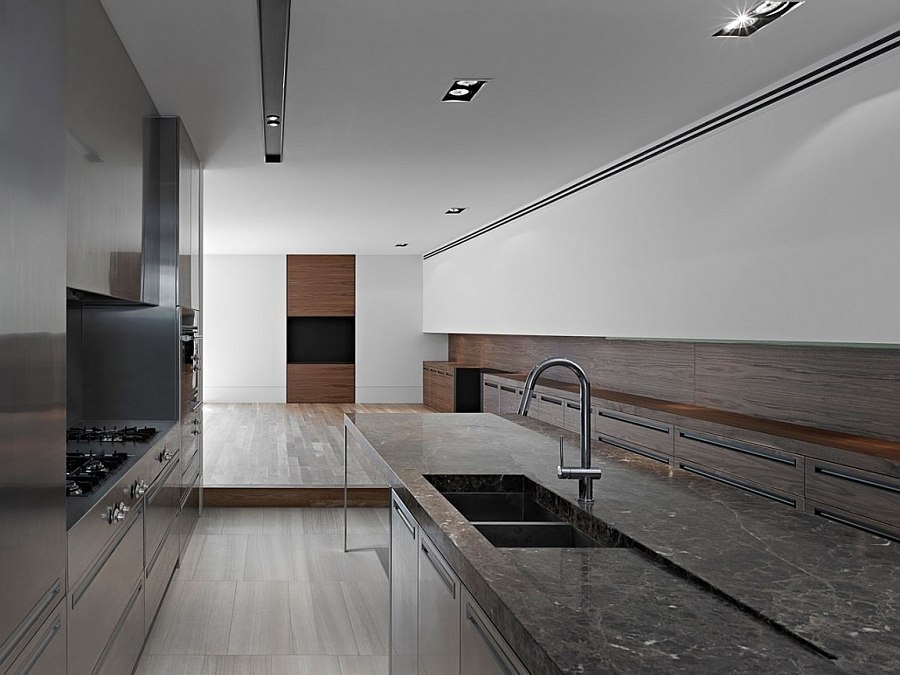 Beautiful blend of stone, wood and metal in the modern kitchen