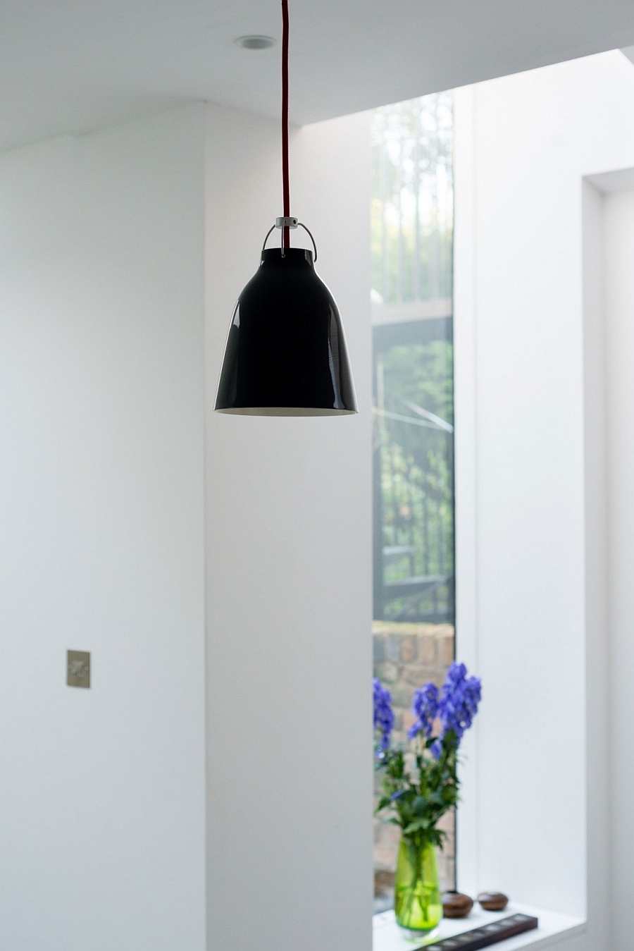 Black pendant light in the modern kitchen