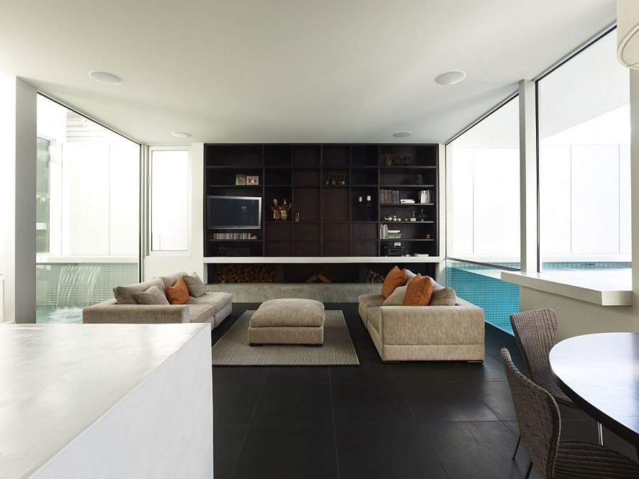 Casual living area of the house flanked by the pool and the pond