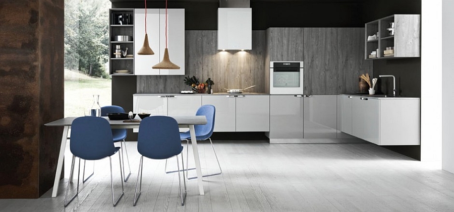 Chairs in blue and pendant lights add to the appeal of the smart kitchen