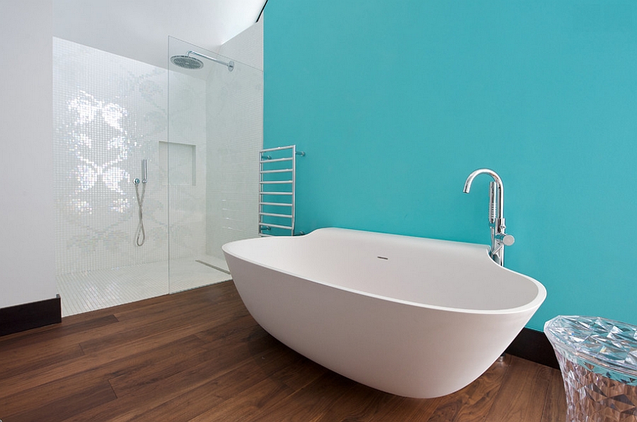 Classy contemporary bathroom with a turquoise accent wall