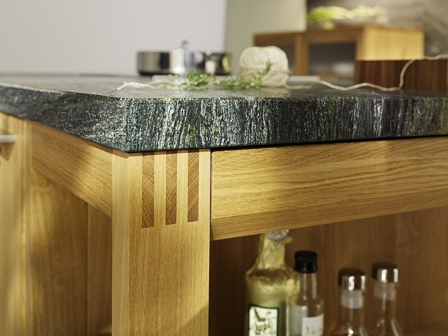 Closer look at the kitchen island in wood and stone