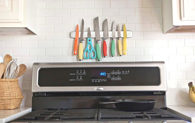 Colorful knives on a knife magnet