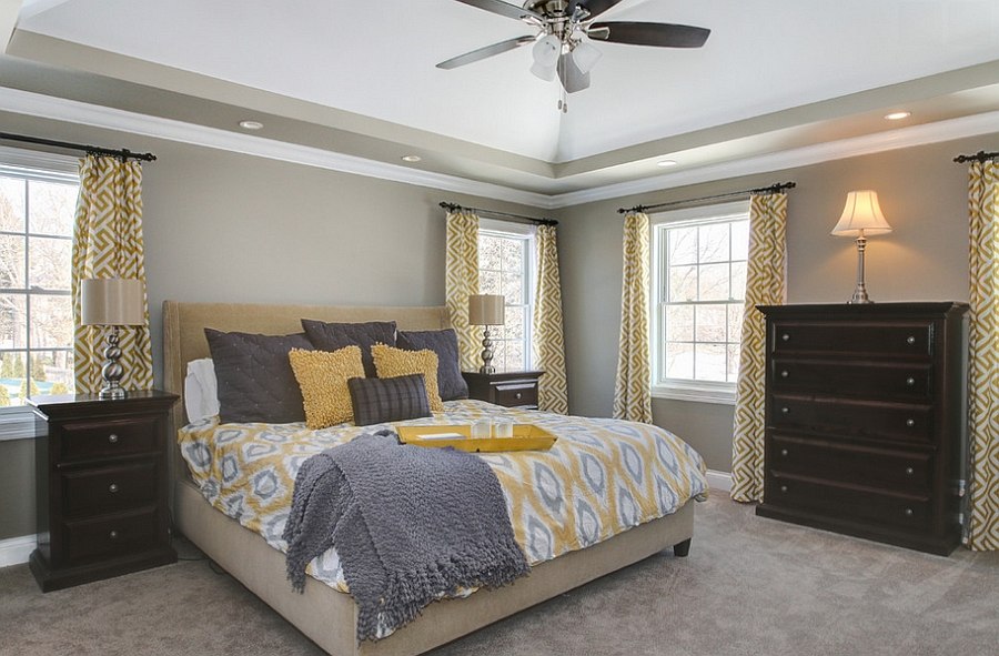 Curtains add geometric pattern to the bedroom