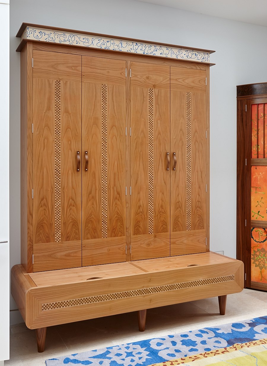 Custom-crafted cabinet offers additional seating space in the kitchen