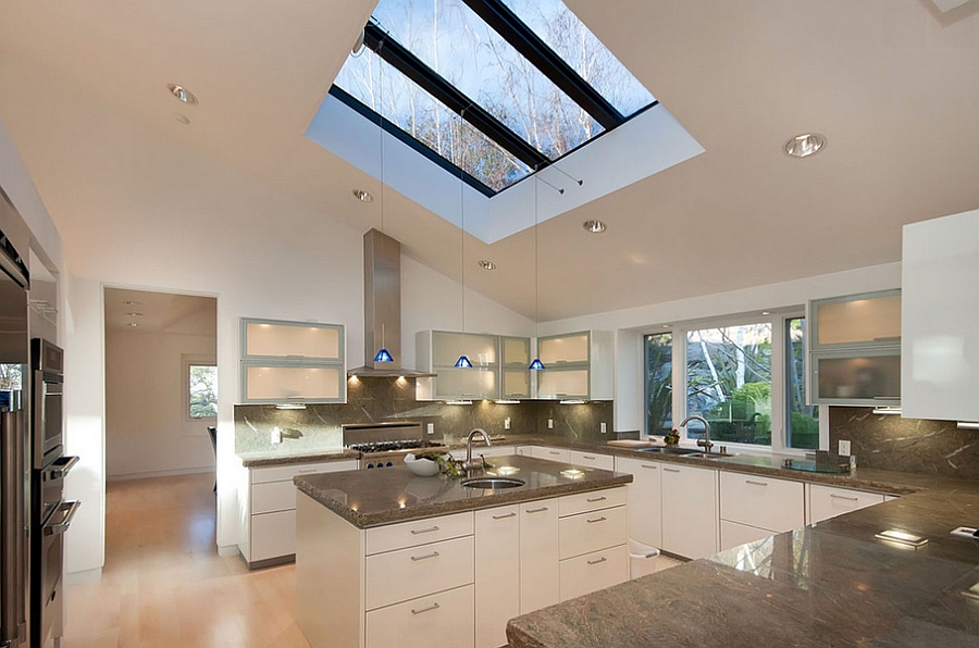 Custom skylights and pendants enliven the modern kitchen