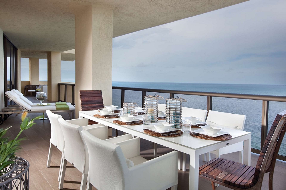 Dining area on the porch with ocean views