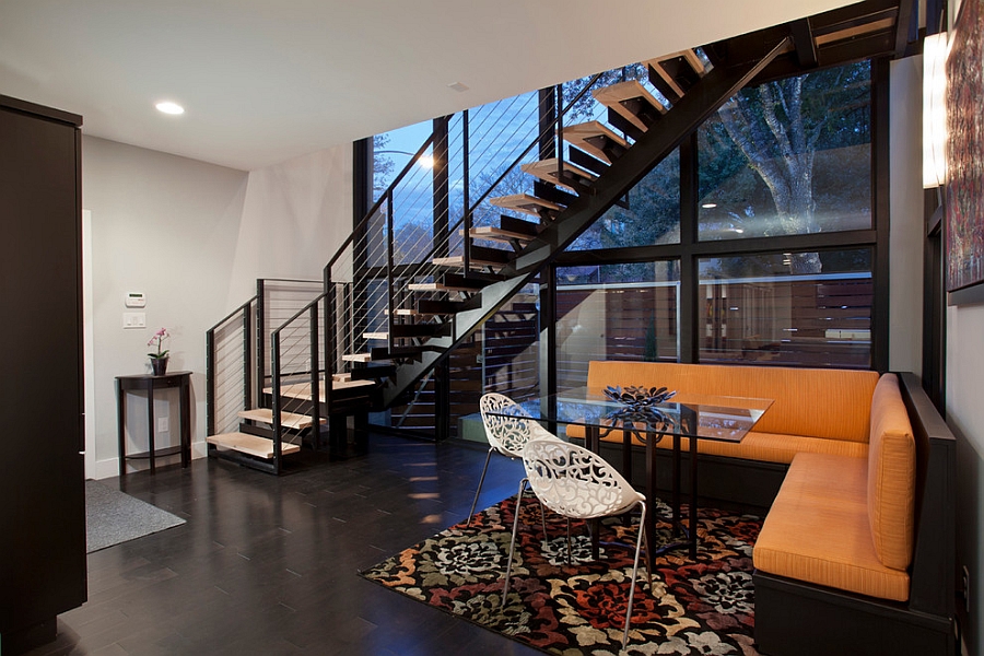 Dining room makes wonderful use of space under the staircase