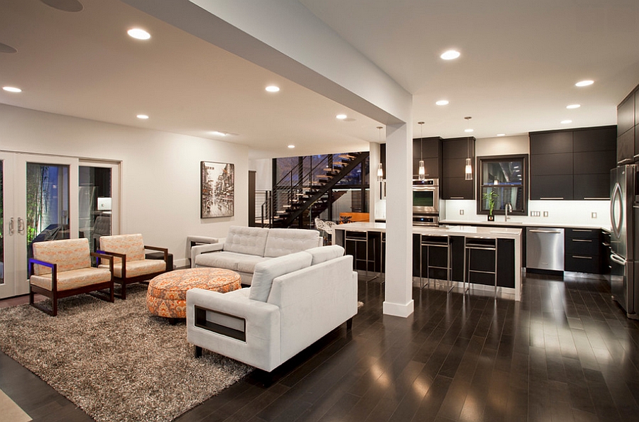 Dark wooden flooring brings an air of sophistication to the room