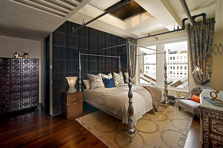 Dramatic tufted wall brings visual softness to the industrial-eclectic bedroom