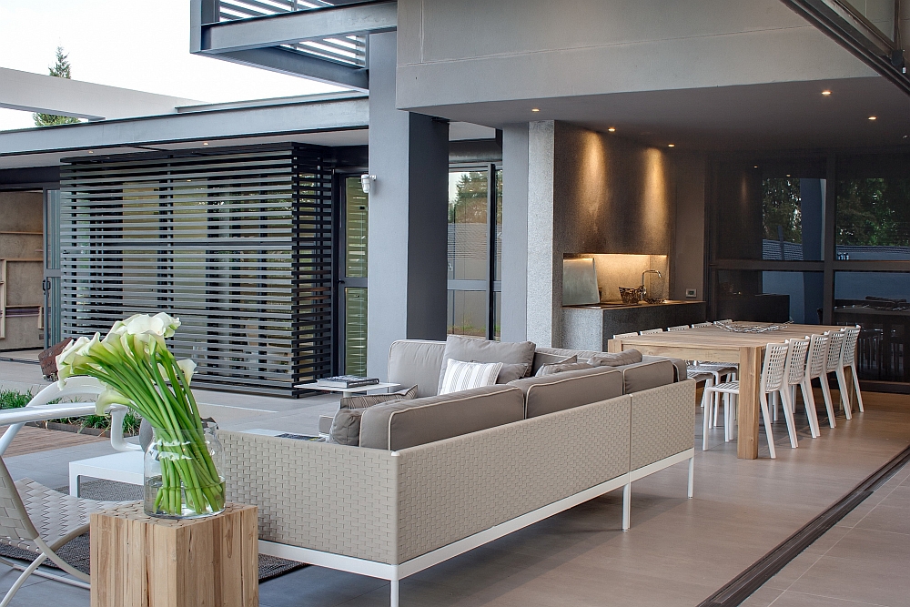 Elegant porch next to teh kitchen connects the interior and the outdoors