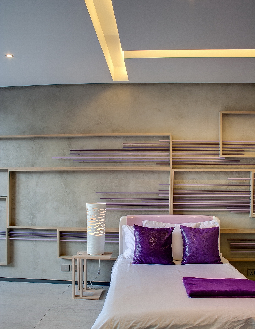 Elegant use of purple in the cozy bedroom