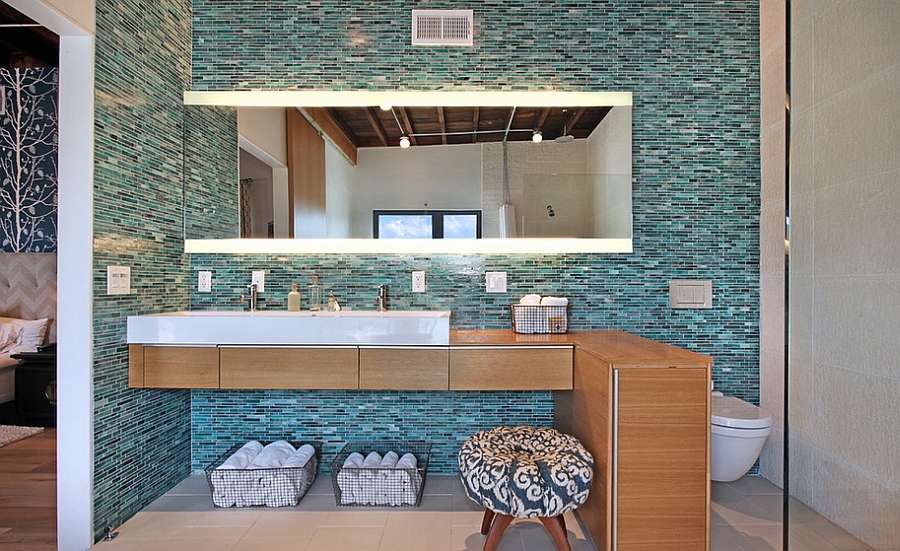 Elegant use of turquoise and black tiles in the bathroom [From: Jeri Koegel Photography]