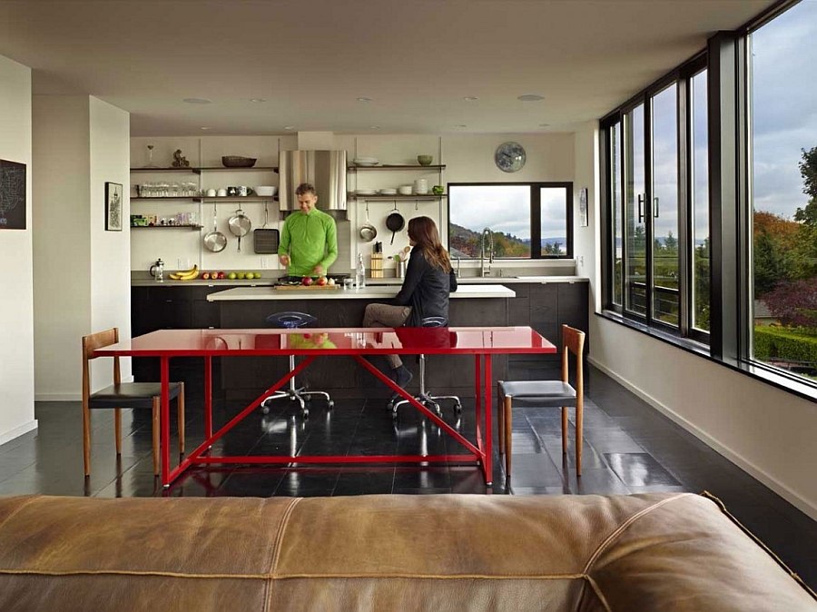 Exciting dash of red enlivens the cool kitchen space