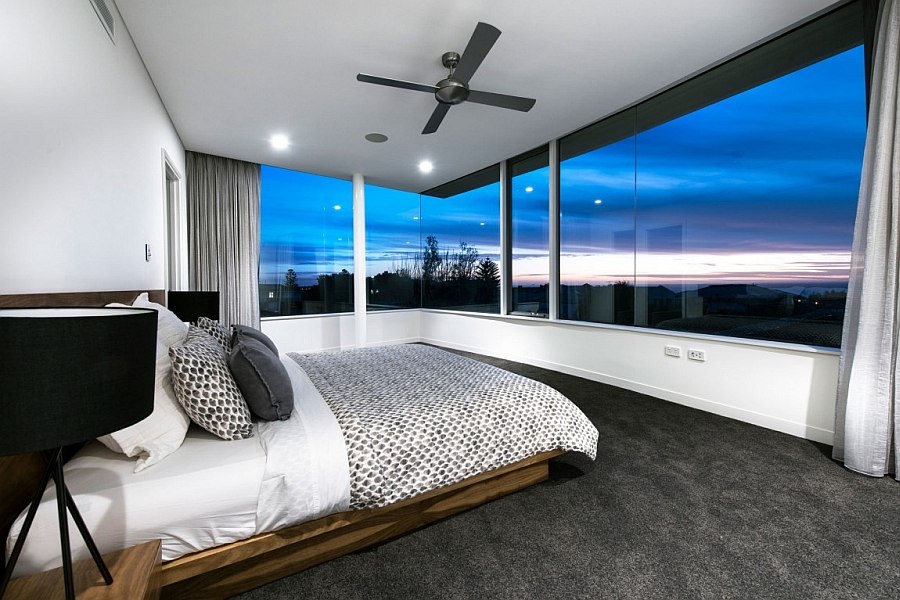 Expansive windows open up the room to the view outside