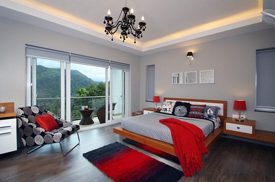 Exquisite use of red accents in the cheerful gray bedroom