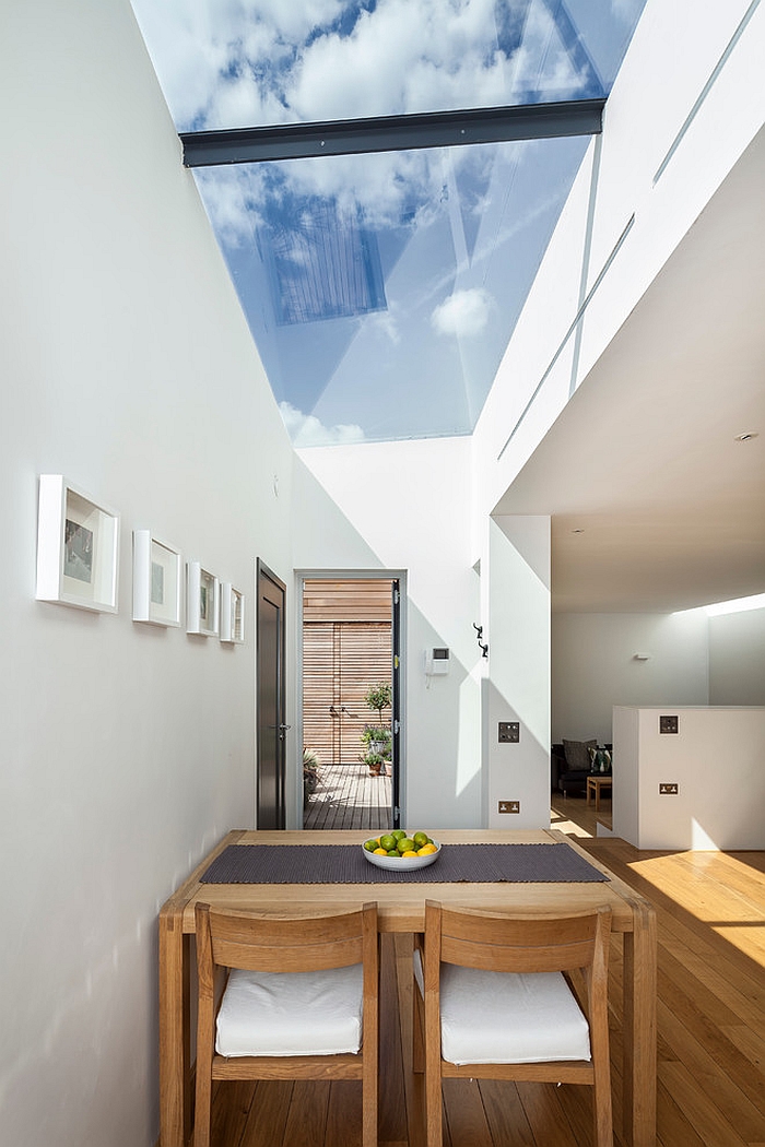 Fabulous contemporary dining room offers a stunning window to the sky! [Design: designcubed]