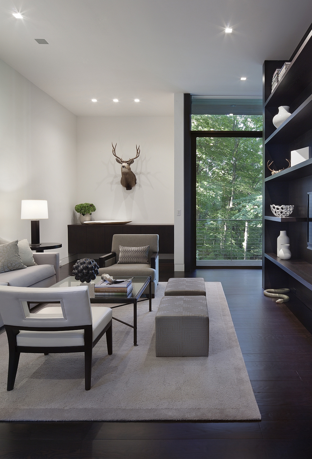 Family area with cube ottomans and open shelves