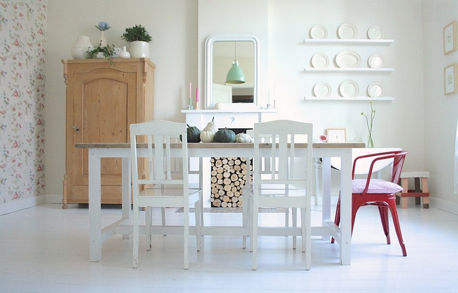 Firewood adds texture and balance to the serene dining room