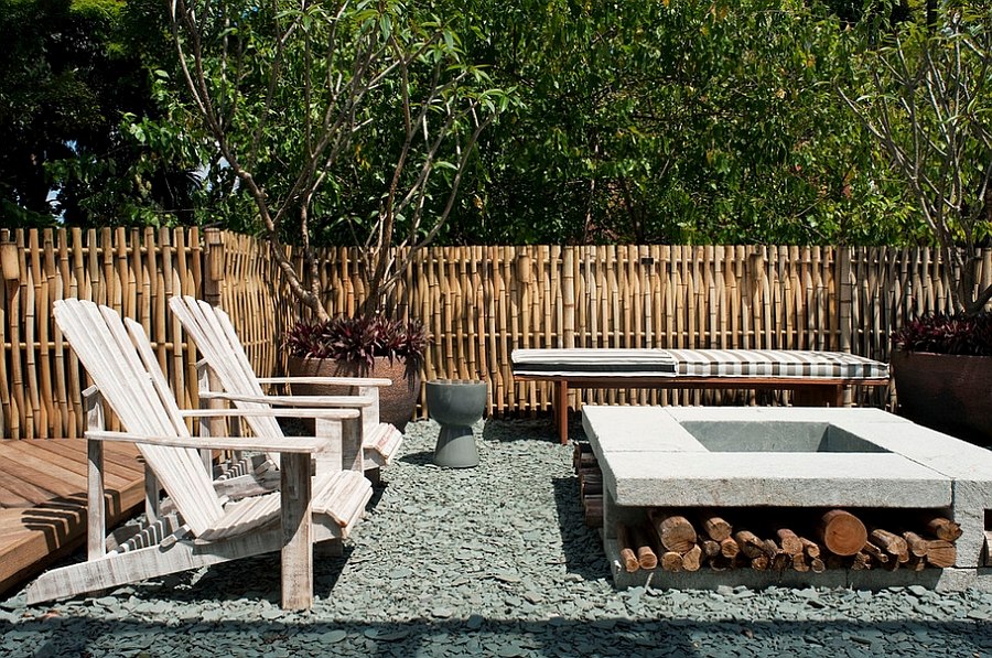 Firewood storage space under the firepit in the patio