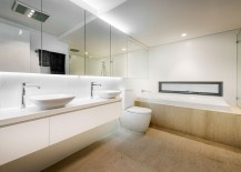 Flooring-adds-a-touch-of-warmth-to-the-minimal-bath-217x155