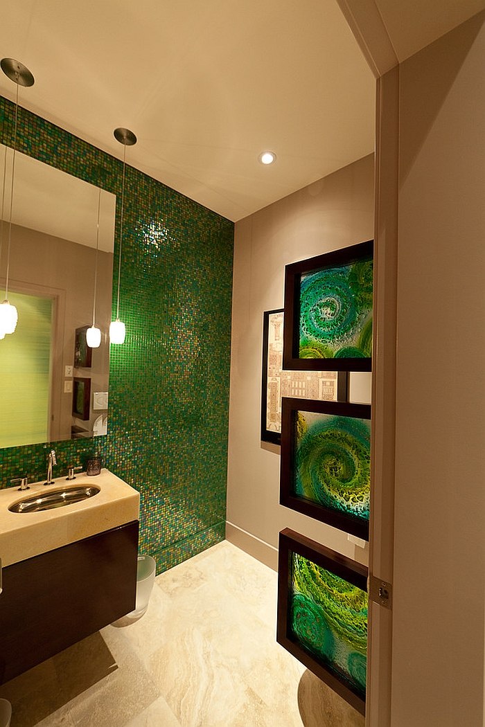 Framed stained glass additions bring artistic elegance to the green bathroom