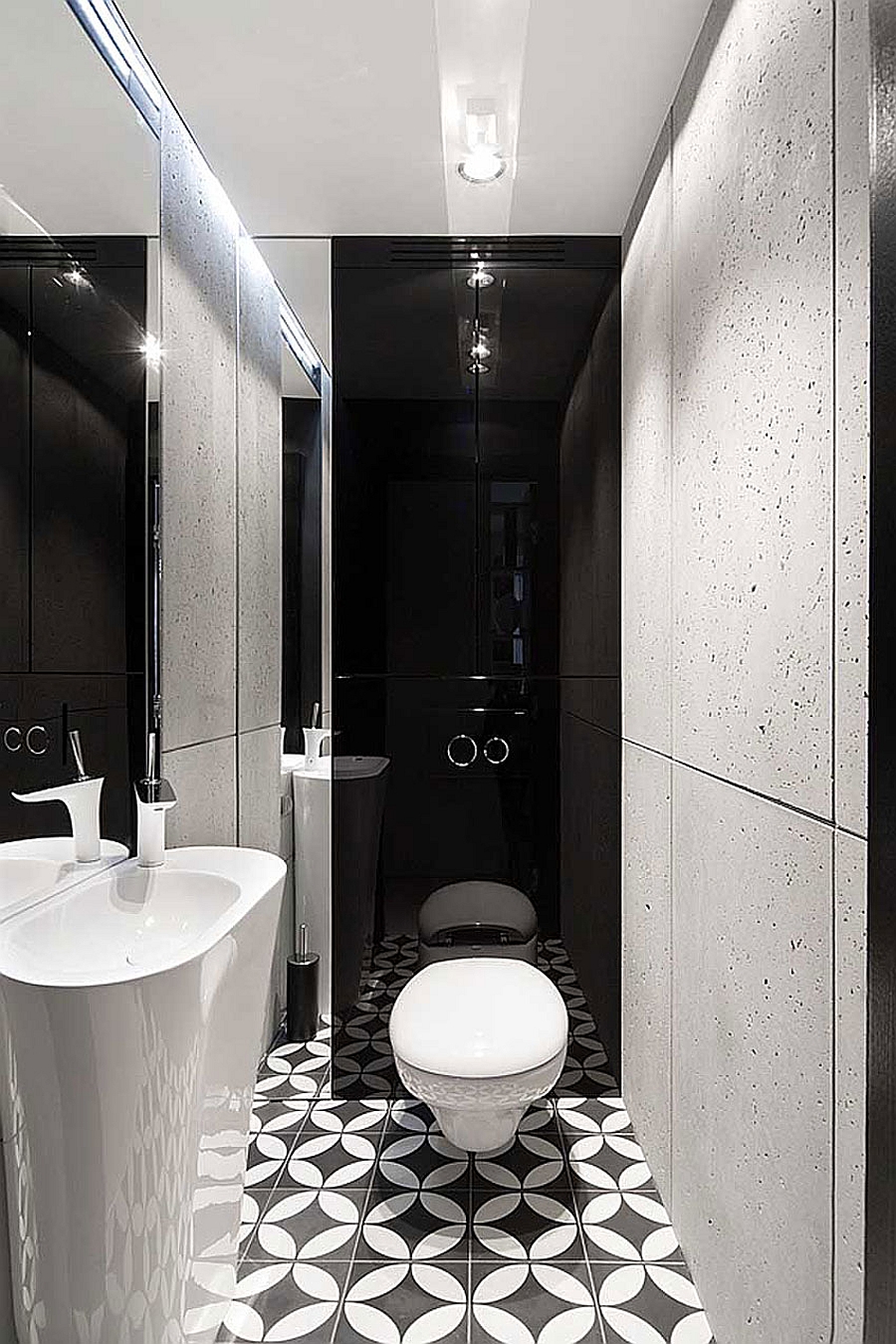 Geometric floor tiles for small black and white bathroom