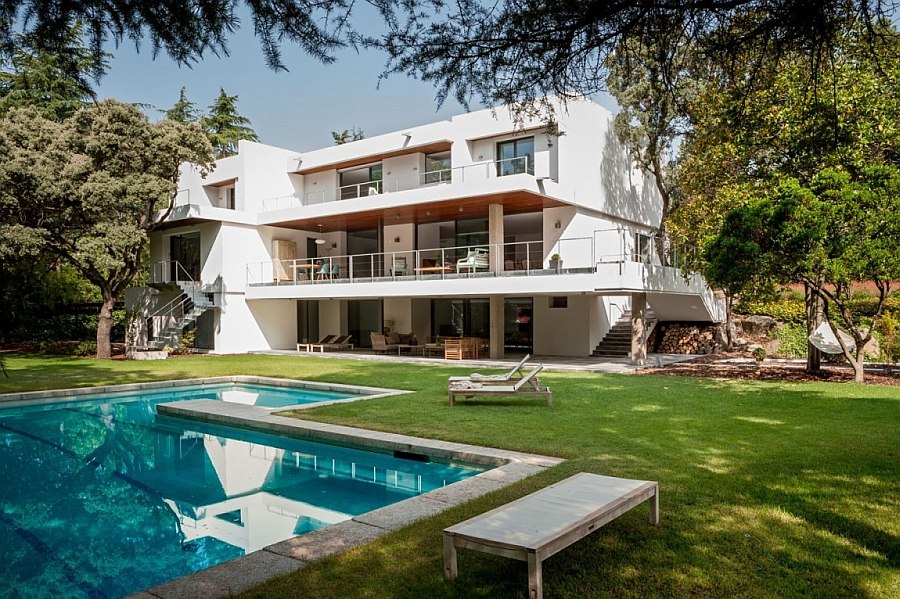 Gorgeous backyard of the expansive Spanish home witha  relaxing pool