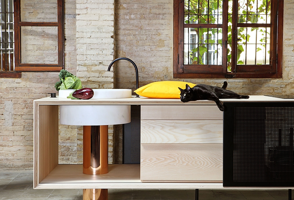 Hand-crafted kitchen island in copper, metal and marble