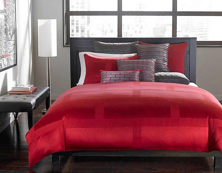 Hotel Collection bedding in red adds drama to the gorgeous bedroom