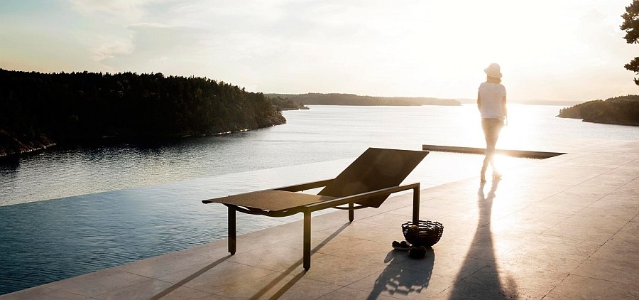 Illum lounger stands as a sculptural addition on the pool deck