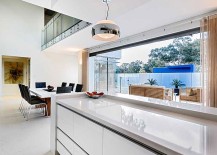 Kitchen-and-dining-room-open-up-towards-the-outdoor-217x155