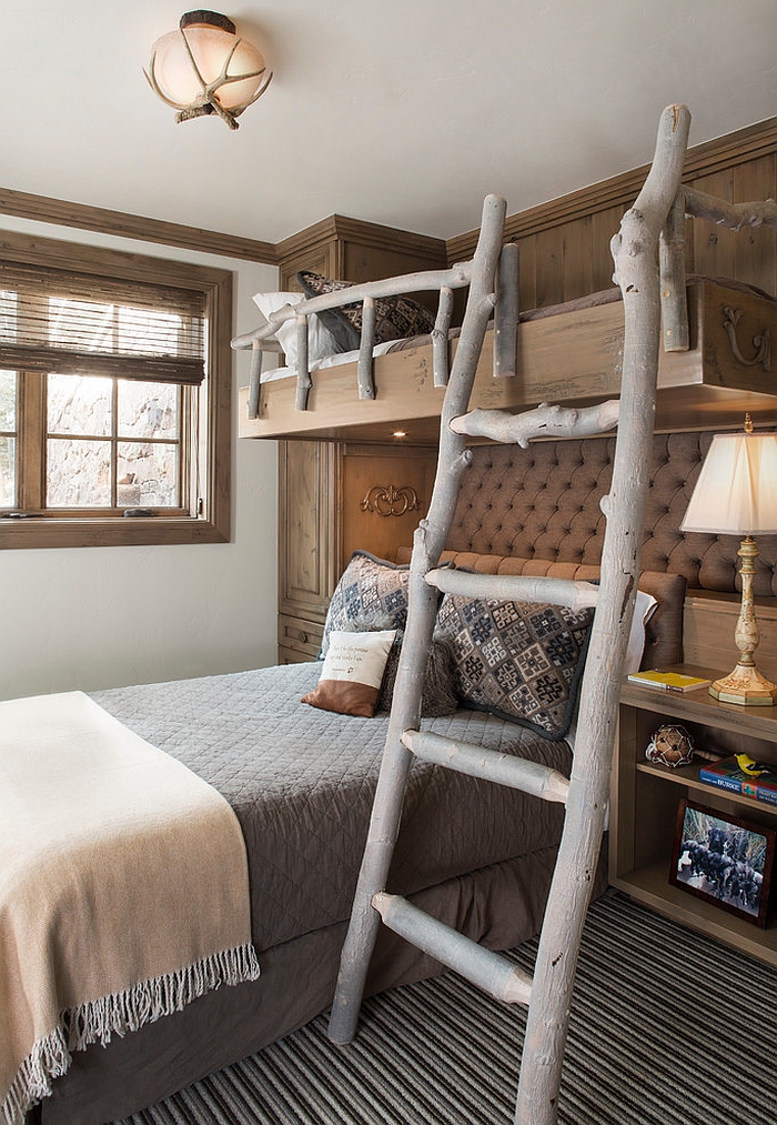 Ladder and railing on the bunk bed give the bedroom a cool touch [Design: Meadow Mountain Homes]