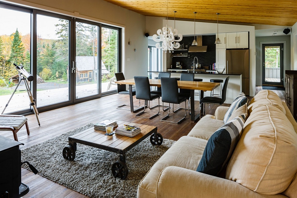 Large glass doors connect the living room with the garden outside