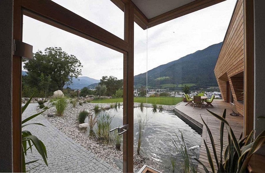 Large glass windows offer stunning view of the natural scenery outside