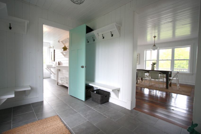 Light aqua door adds a subtle pop of color