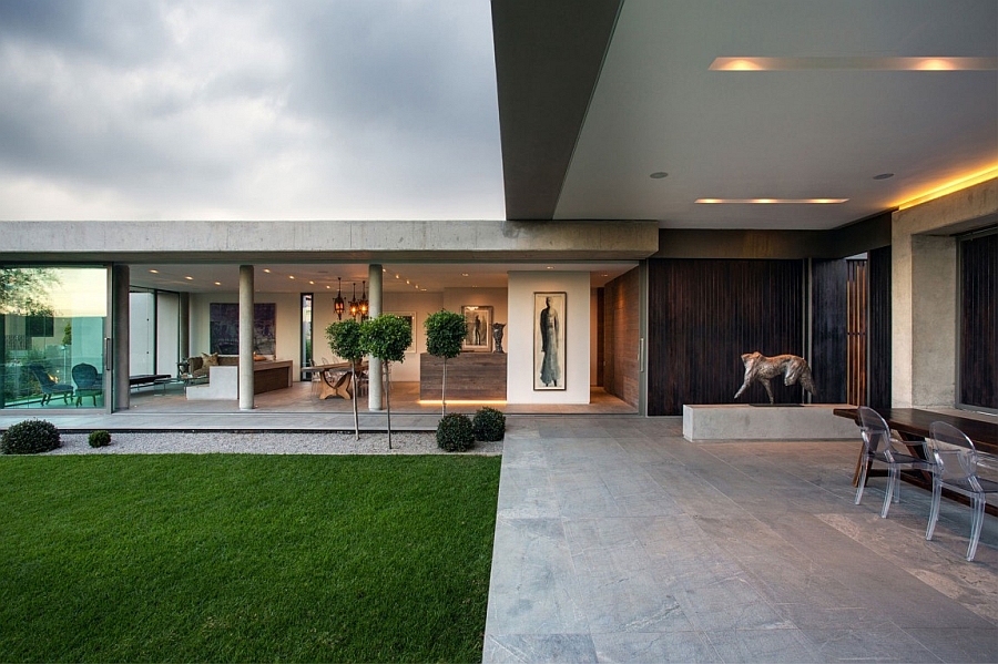 Living and dining area of the house connected with the garden outside